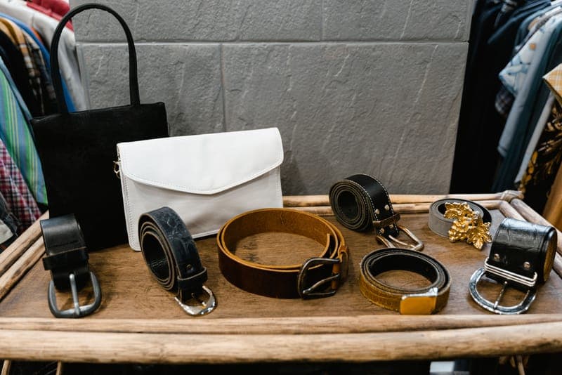 Leather belts and bags in a workshop