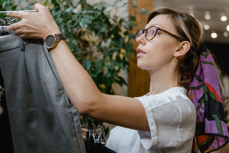 A shopper weighing up two gift options