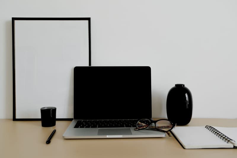 A tidy desk with a few carefully chosen objects