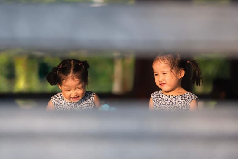 Two sisters laughing together