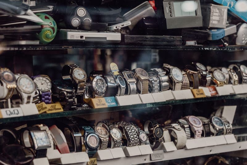 Watches displayed in a shop cabinet